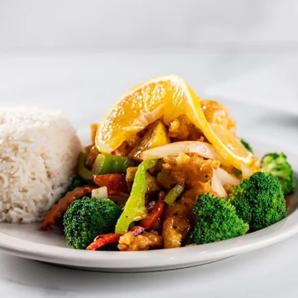 Zato Thai Cuisine's orange chicken with broccoli, bell peppers, onions, and white rice.