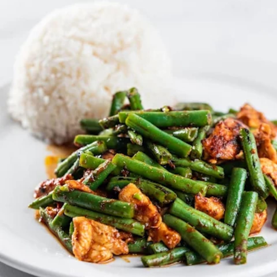 Zato Thai Cuisine's green bean and chicken stir-fry with a side of white rice.